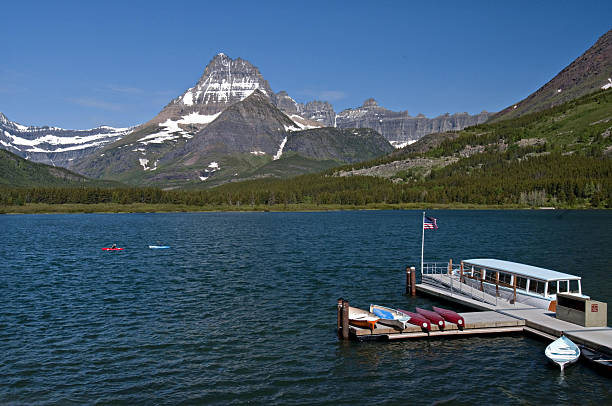 Salmon fishing at Chilkoot Lake with Alaskan mountains in the background