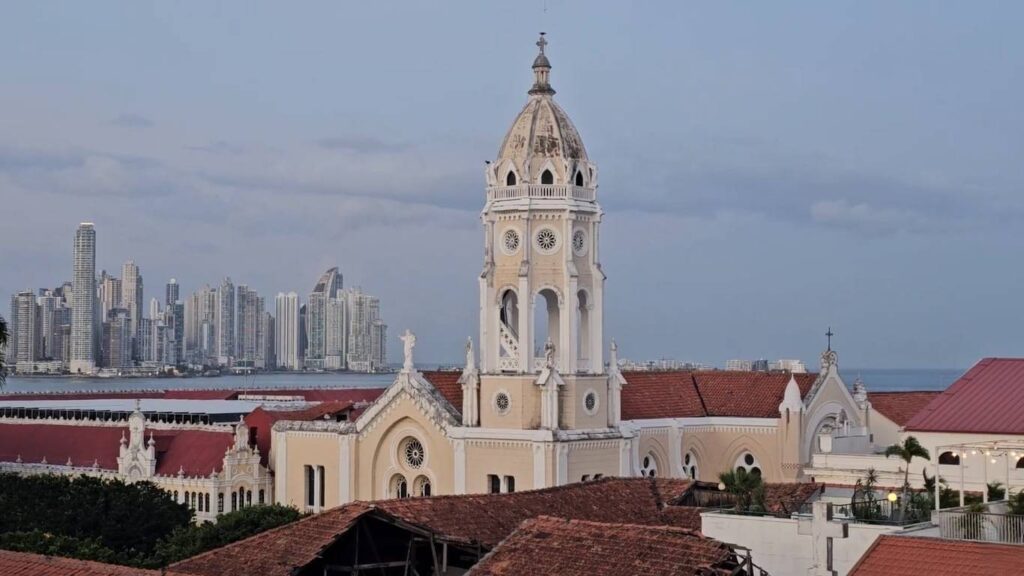Room balcony view at Central Hotel Panama with Casco Viejo cathedral and Panama City skyline