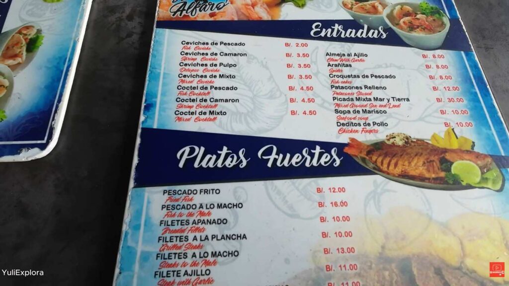 Seafood menu board listing fish and ceviche dishes at Mercado de Mariscos